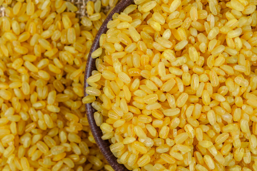 dry bulgur wheat in a bowl close up.