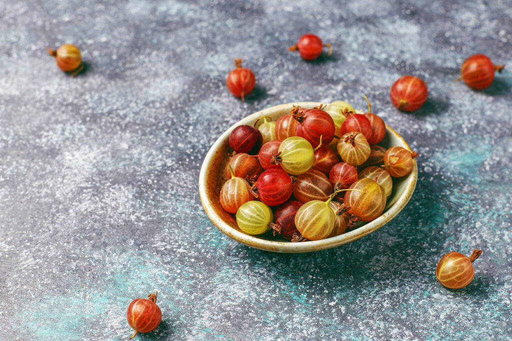 fresh organic sweet gooseberries in bowl